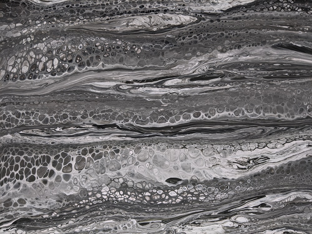 a black and white abstract painting of water