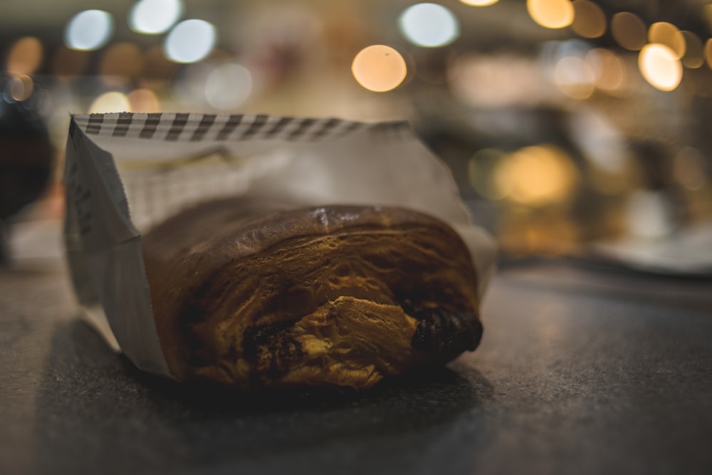 a close up of a piece of food on a table