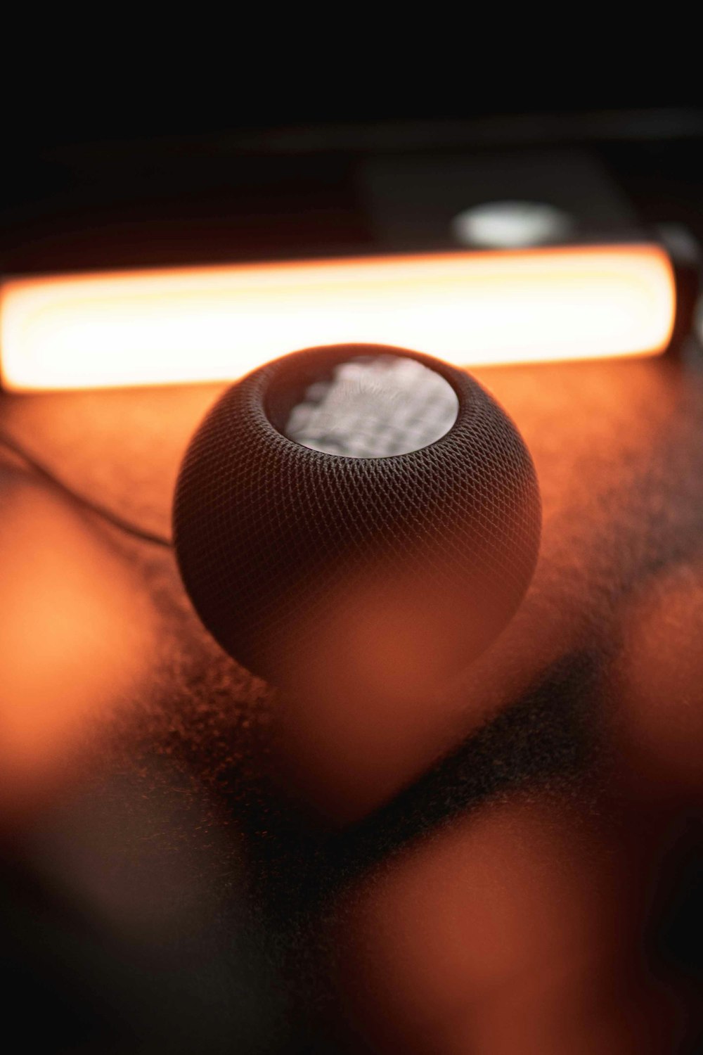 a close up of a speaker on a table