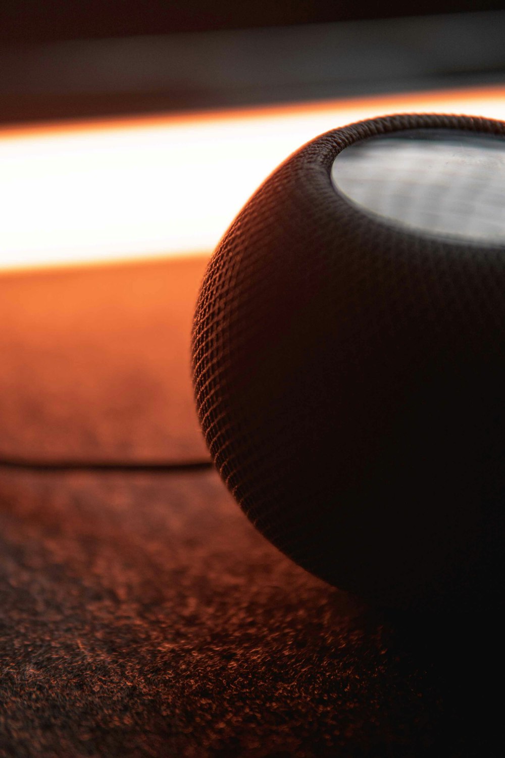 a close up of a speaker on a table