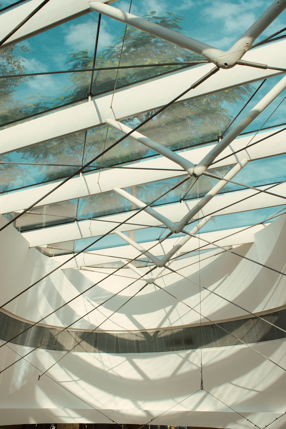 a view of the inside of a building with a skylight