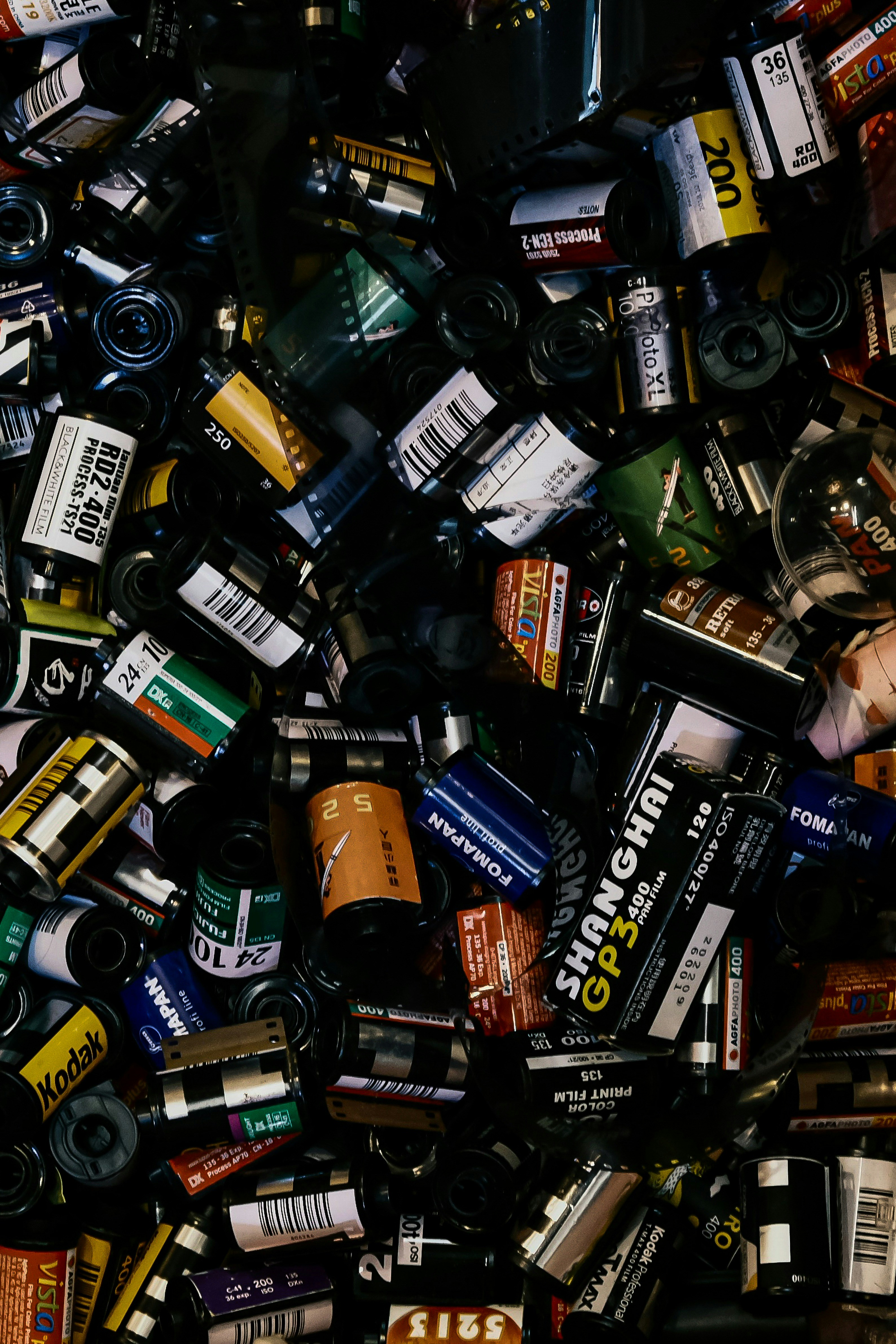 a pile of batteries and batteries sitting next to each other