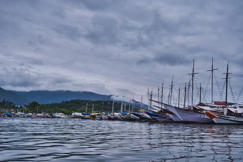 a bunch of boats that are sitting in the water