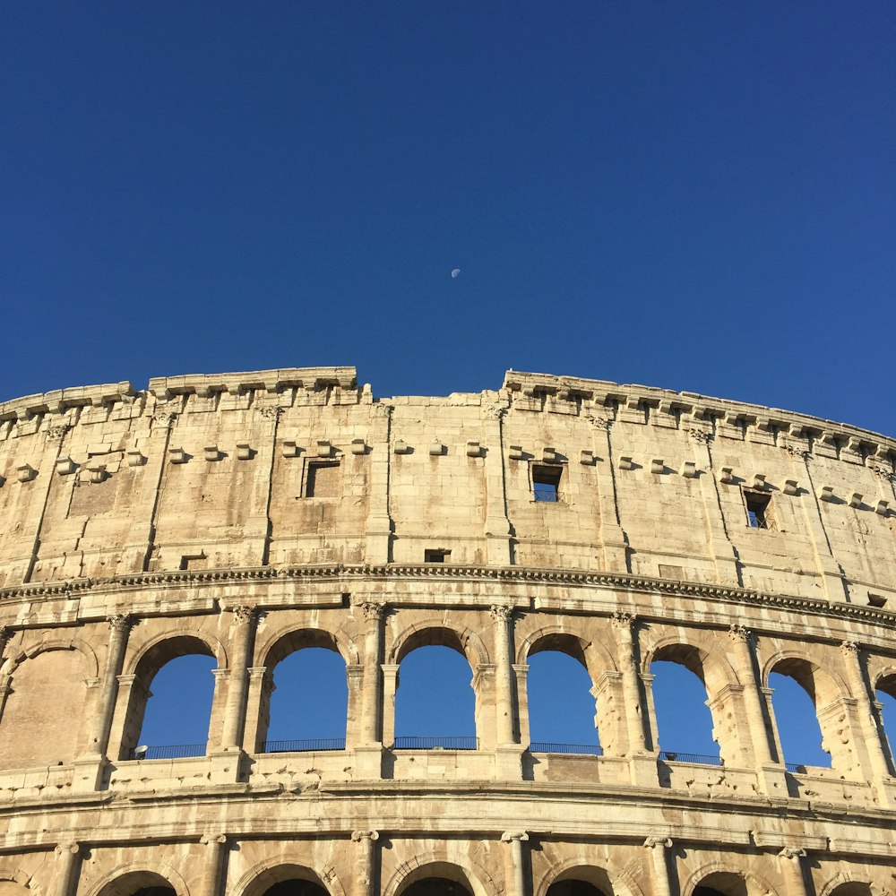 a close up of the side of an ancient building