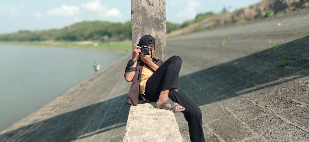 a man taking a picture of himself with a camera