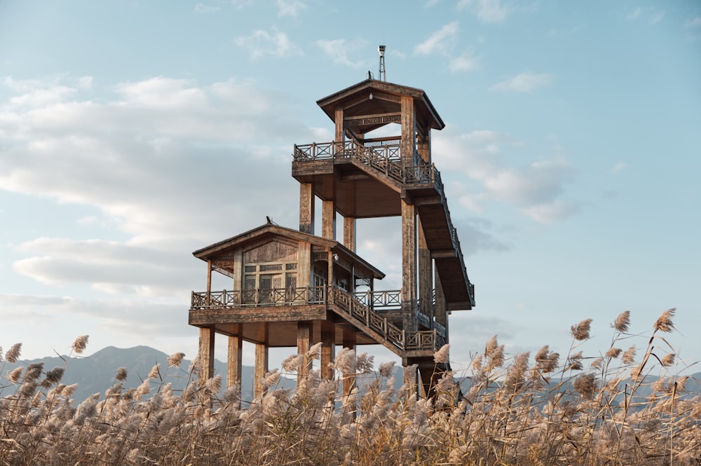 a tall tower with a clock on the top of it