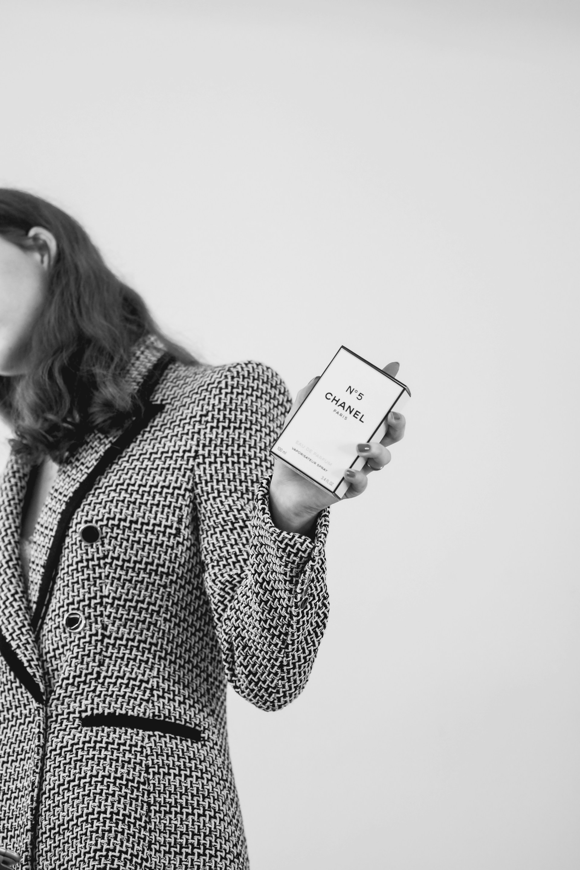 woman wearing yellow long-sleeved dress under white clouds and blue sky during daytime