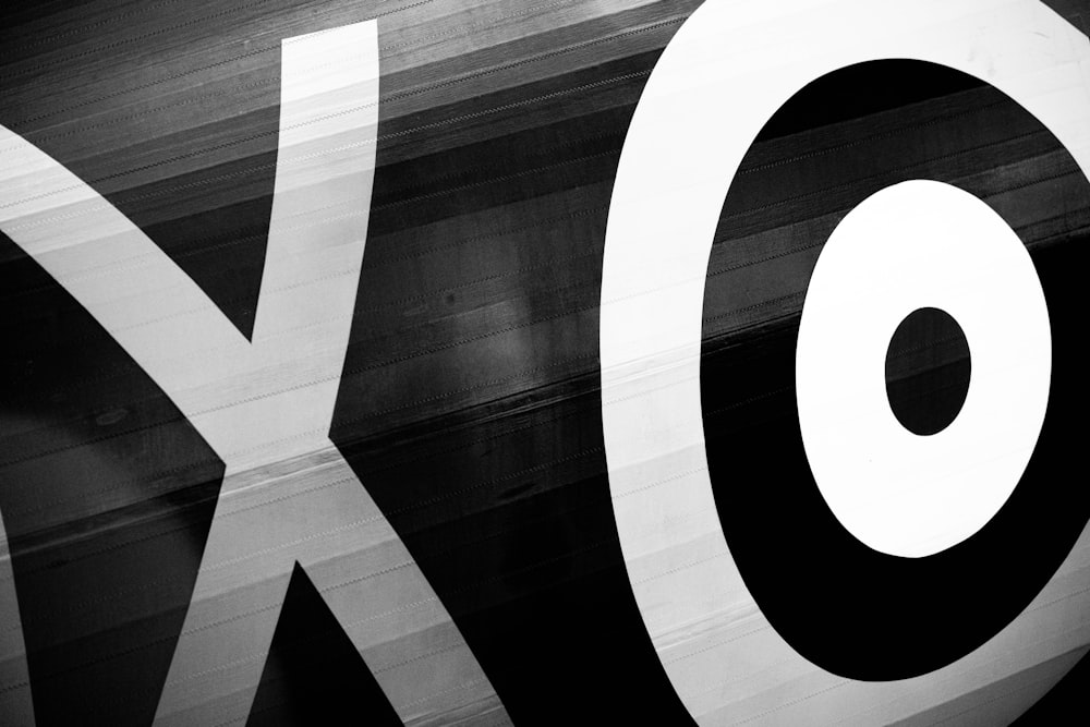 a black and white photo of a target sign