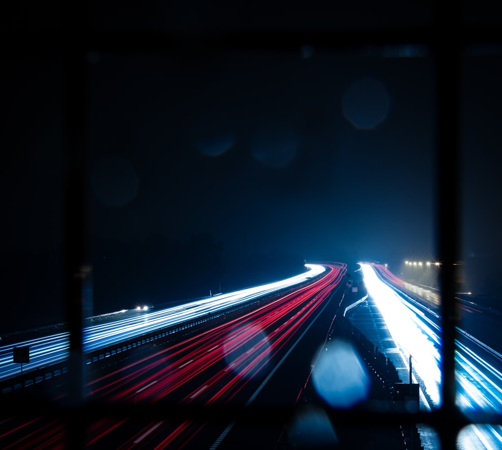 a view of a highway at night from a window