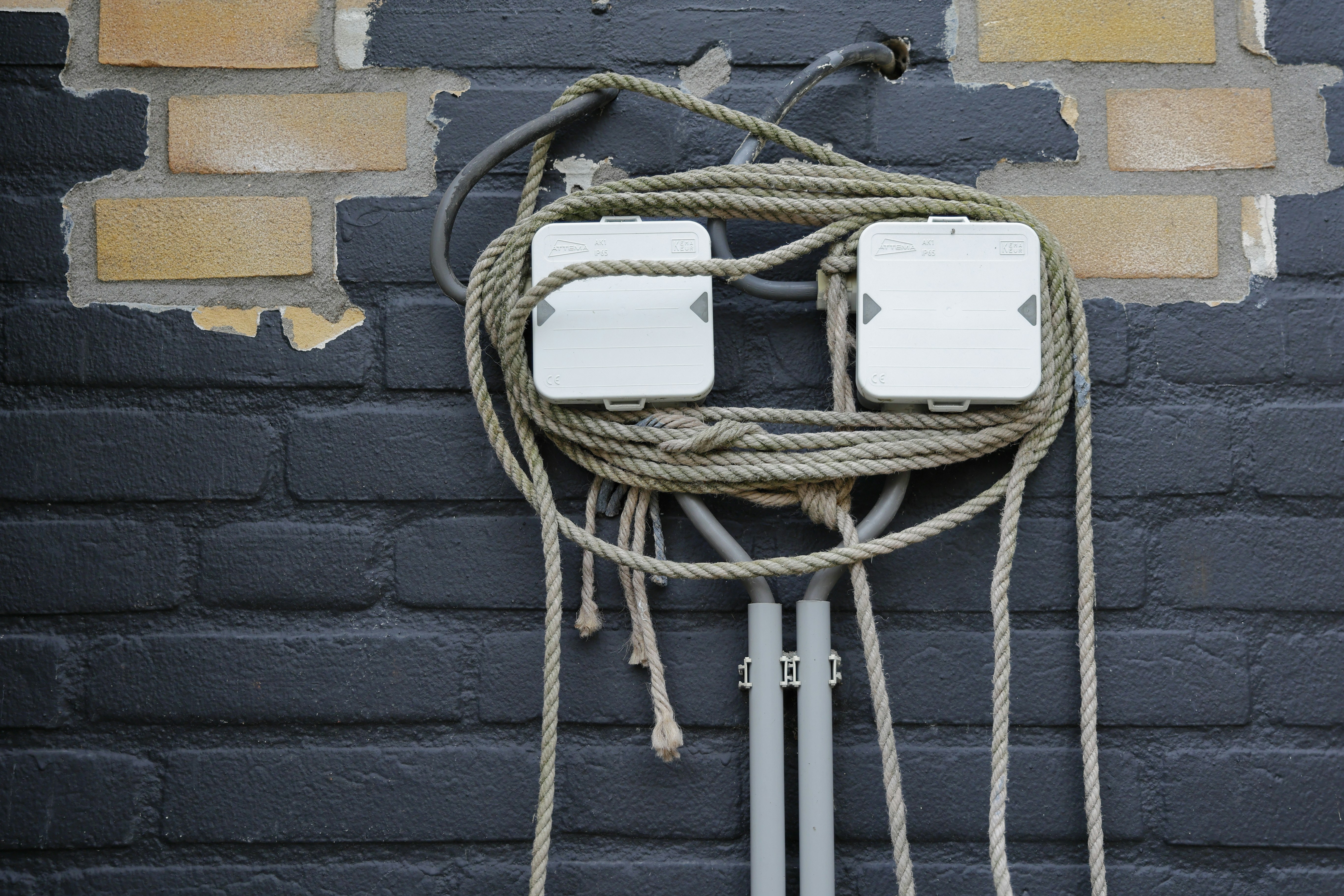 a couple of wires that are attached to a wall