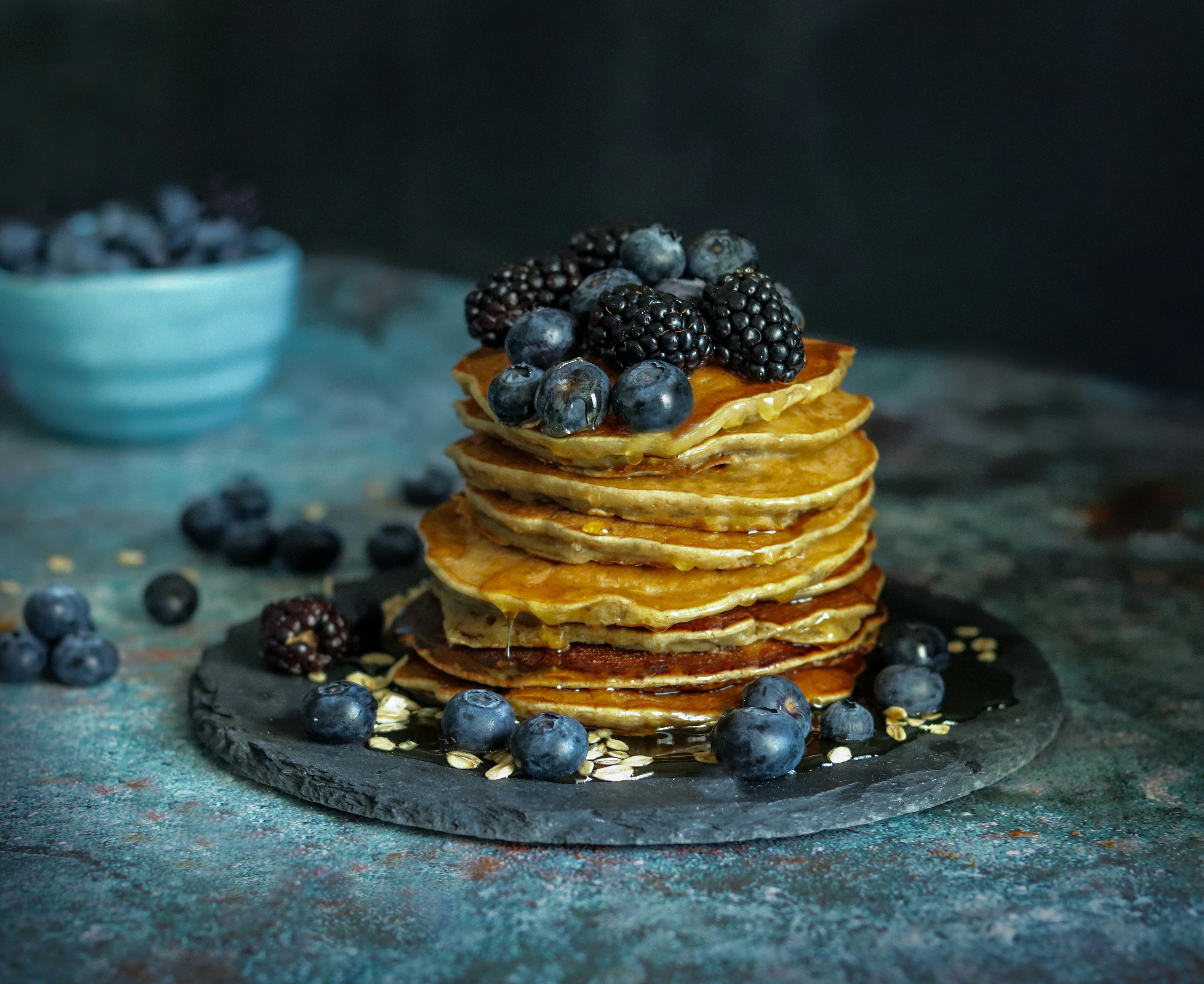 Creative vegan pancake stack with berries and syrup - vegan brunch Gold Coast