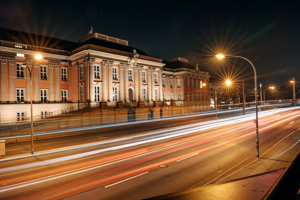 a long exposure photo of a building at night