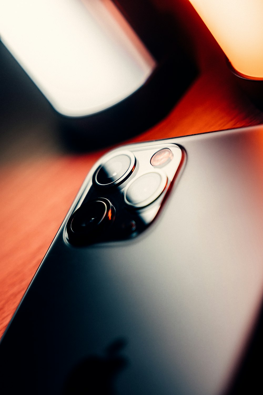 a close up of a cell phone on a table