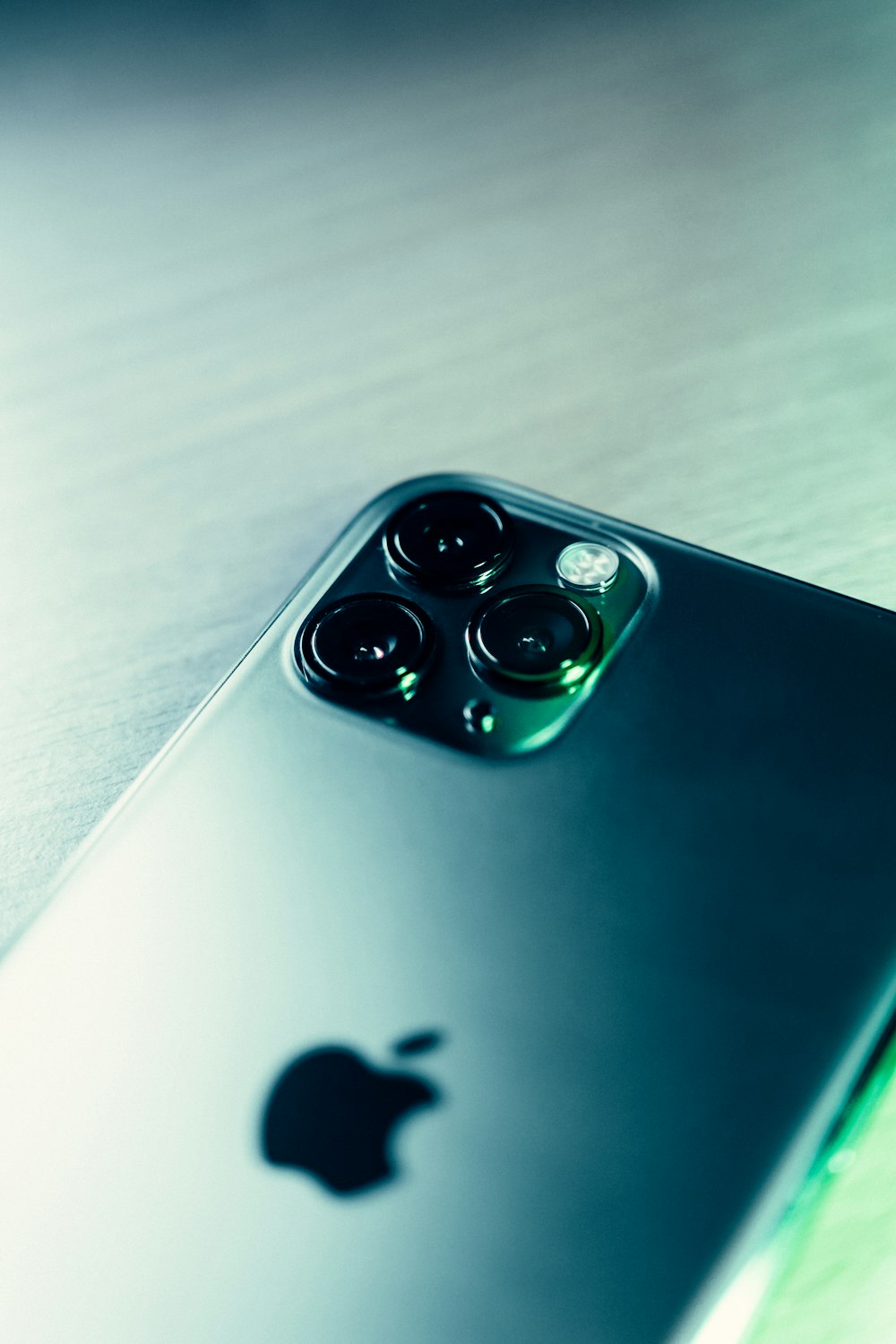 a close up of a cell phone on a table