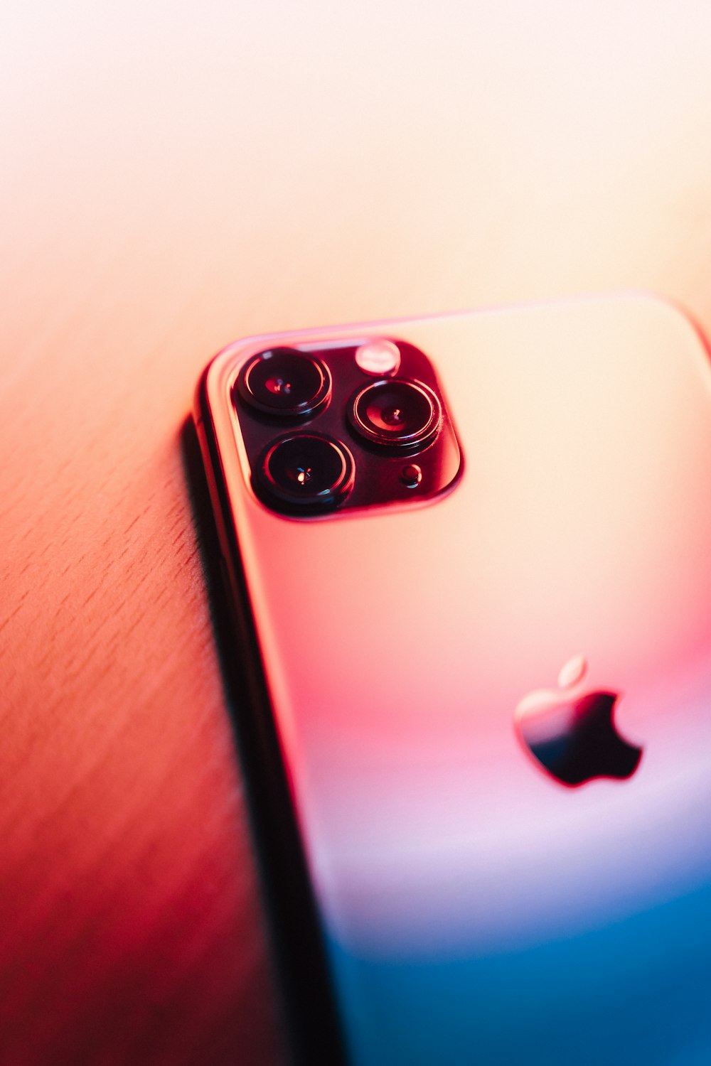 a close up of a cell phone on a table