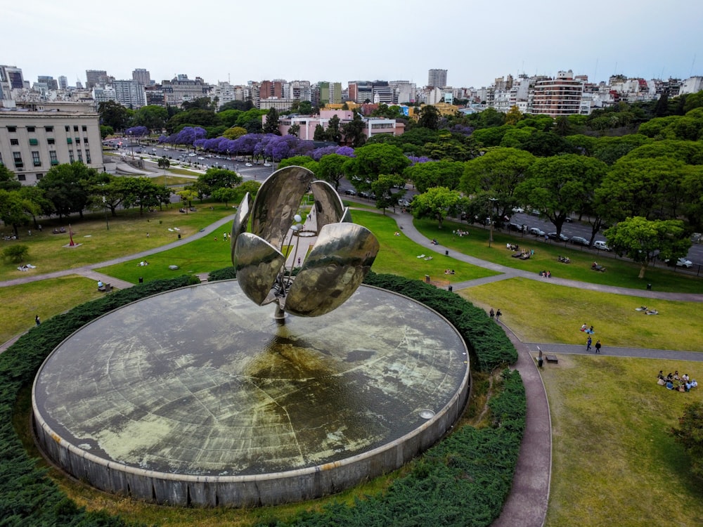 an aerial view of a circular sculpture in a park