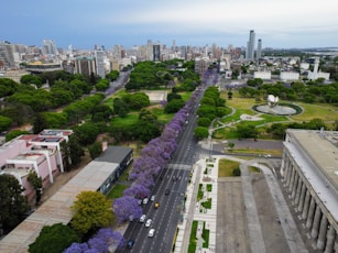 an aerial view of a city with tall buildings