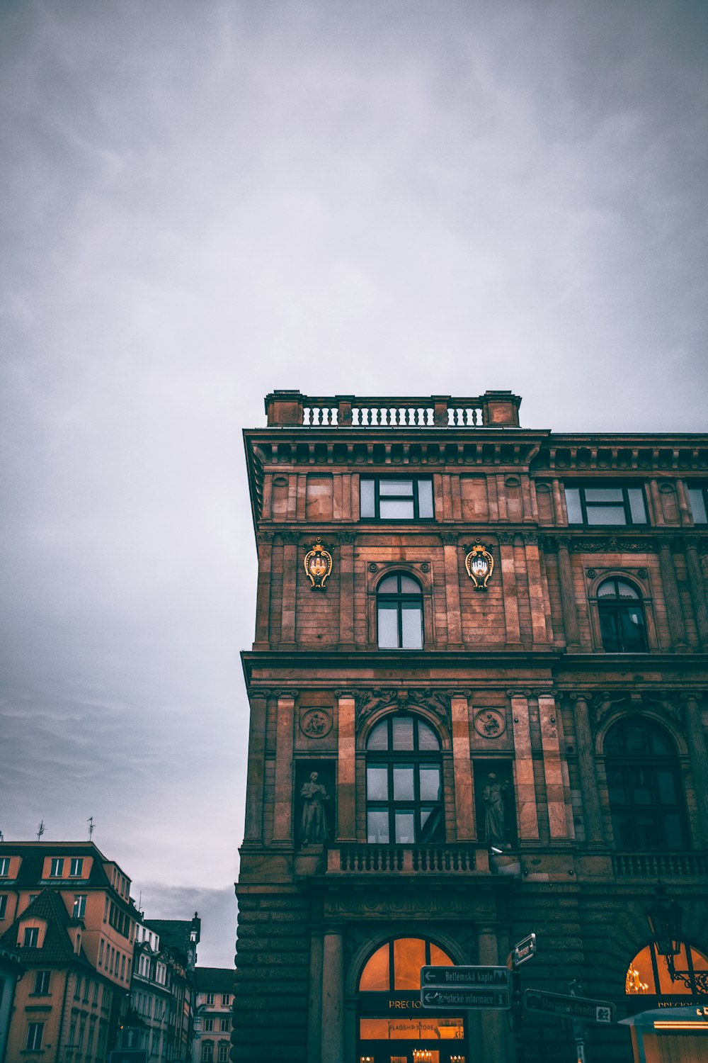 a tall building with a clock on the front of it