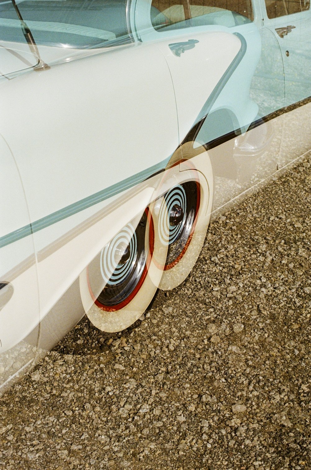 a close up of a car's rear tire