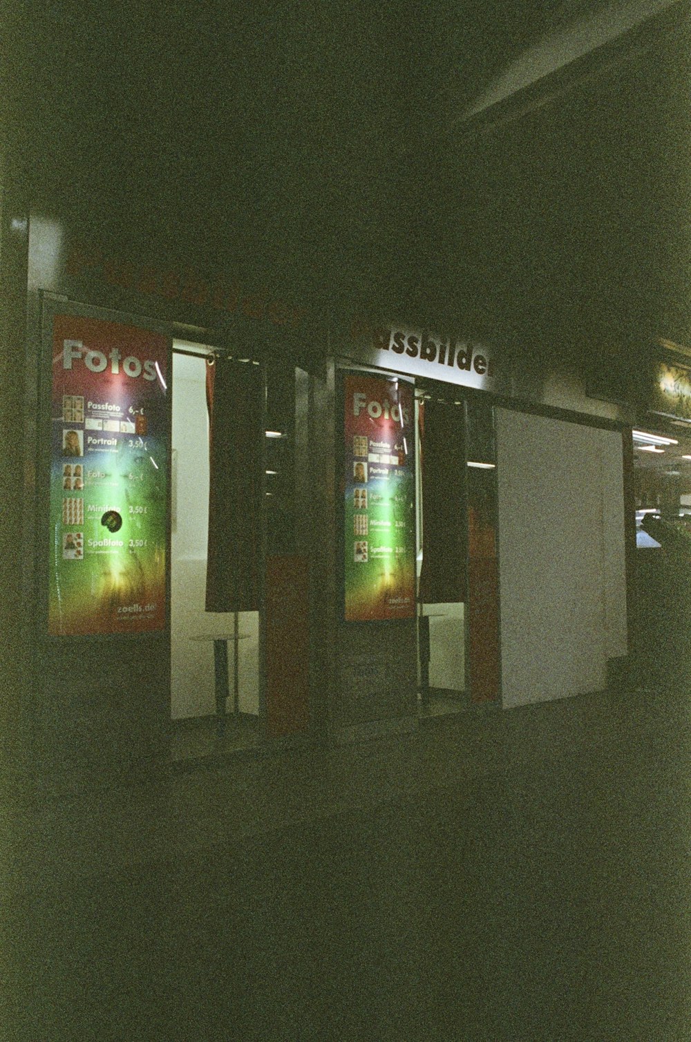 a bus stop with a bus parked next to it