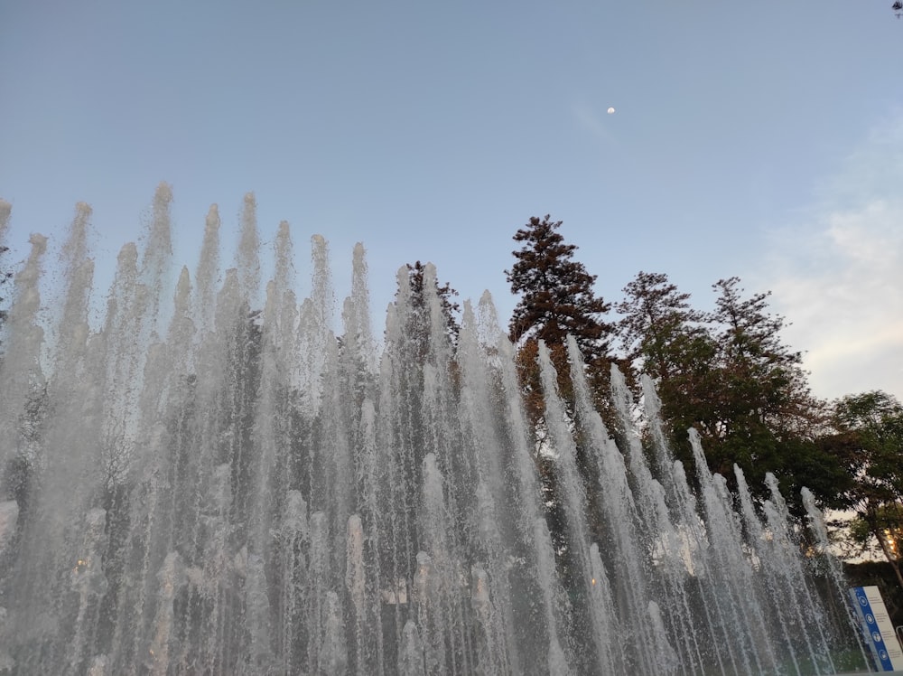 a large water fountain with lots of water spewing out of it