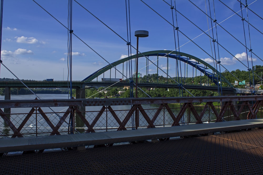 a view of a bridge from across the river