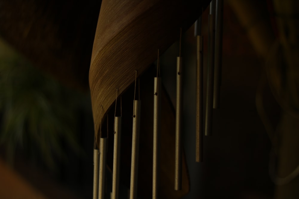 a close up of a wooden wind chime