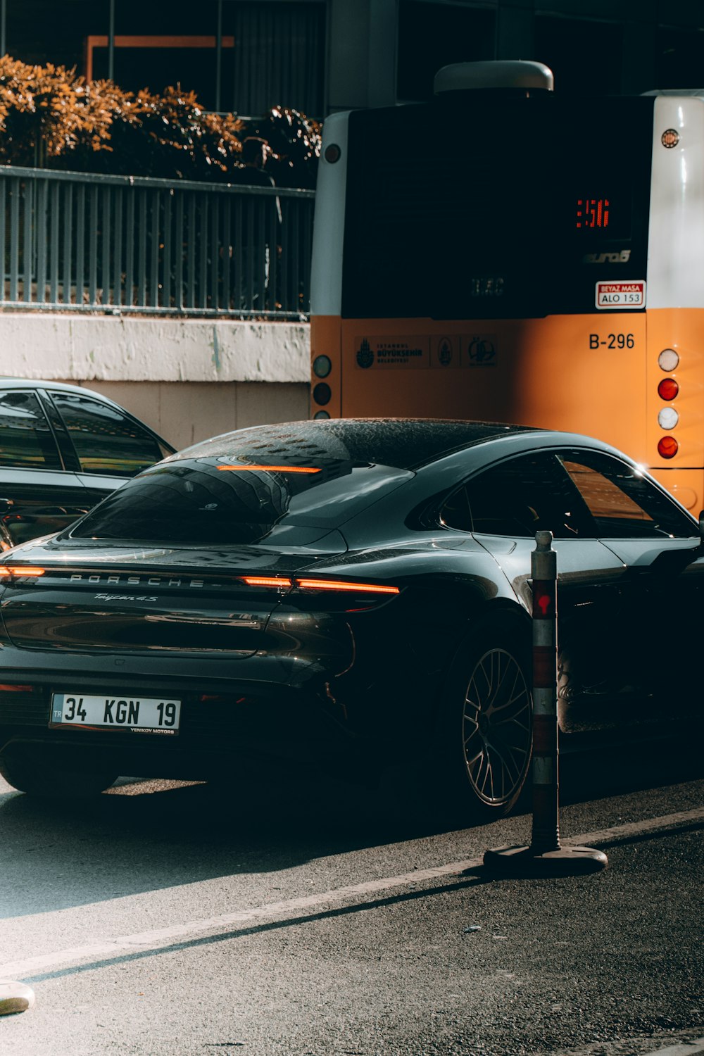 a black sports car parked on the side of the road