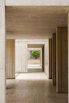 an empty room with wooden floors and walls
