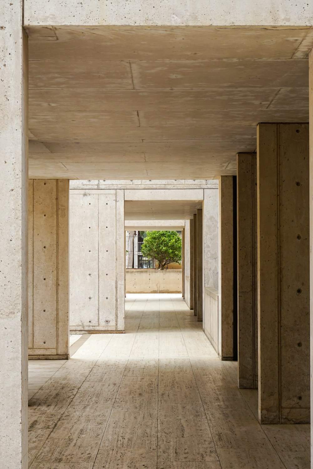 an empty room with wooden floors and walls