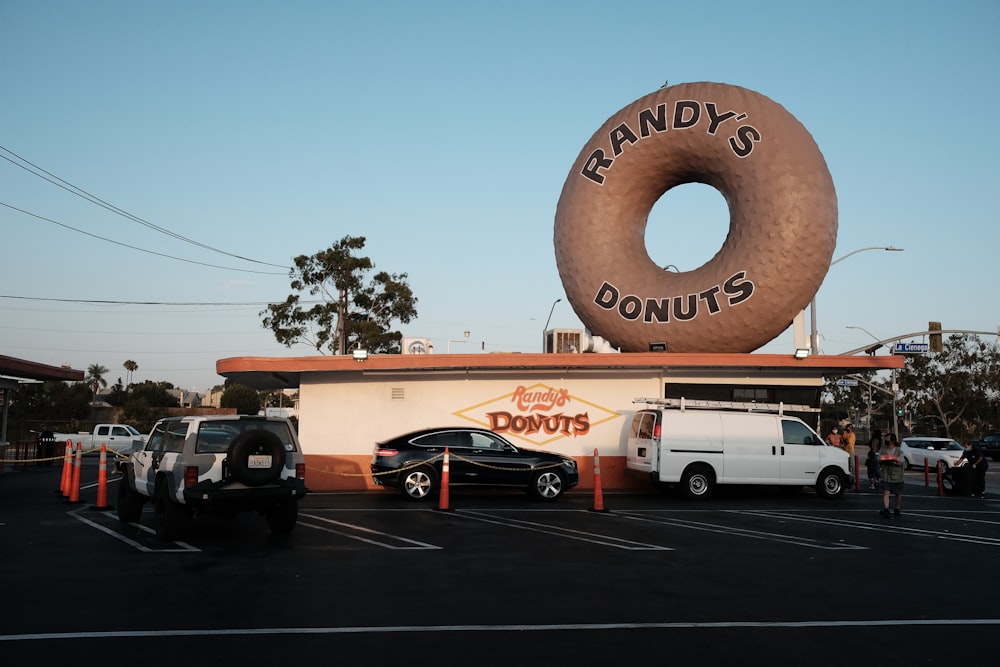 a donut shop with a giant donut on top of it