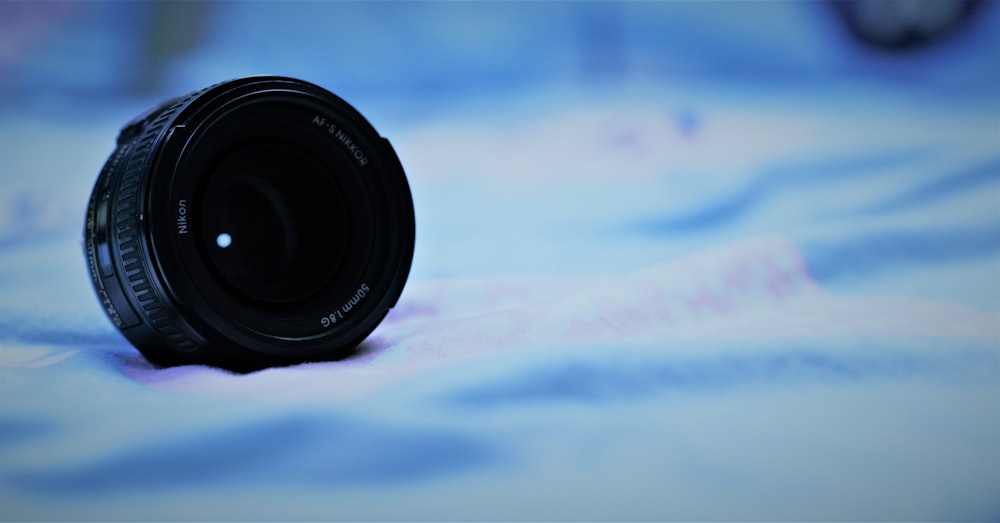 a close up of a camera lens on a table