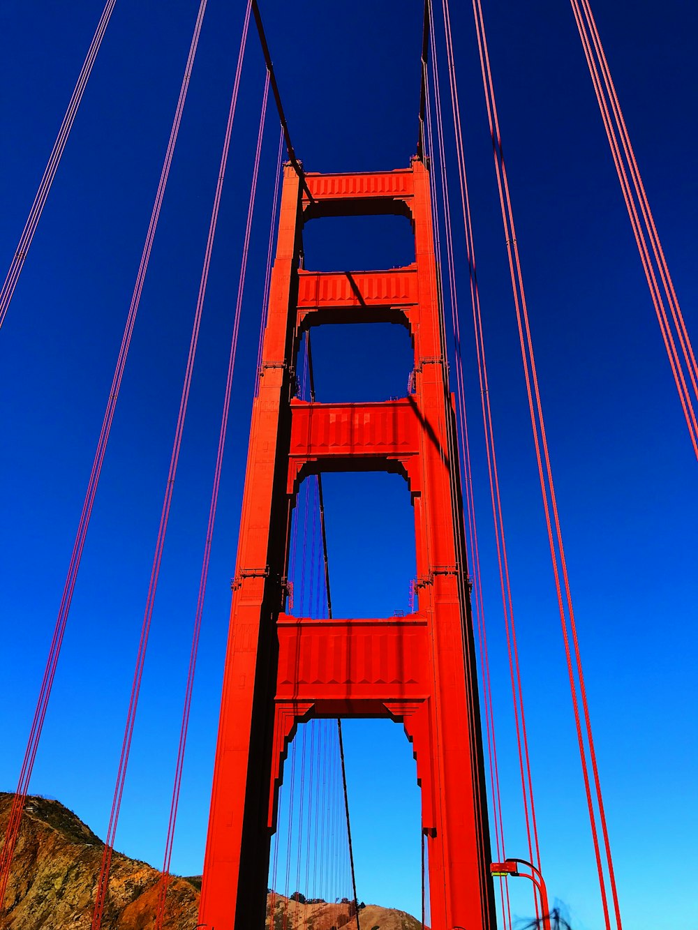 a view of the golden gate bridge from below