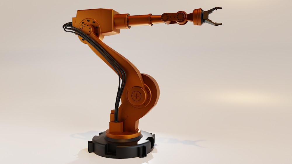 un bras robotique est connecté à une souris d’ordinateur