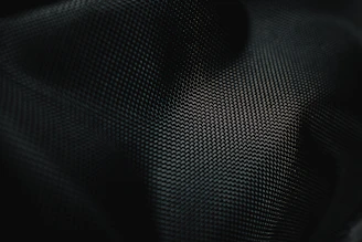a close up of a black fabric texture