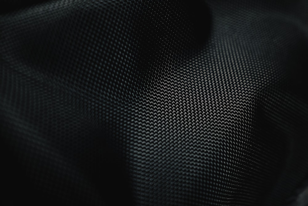 a close up of a black fabric texture