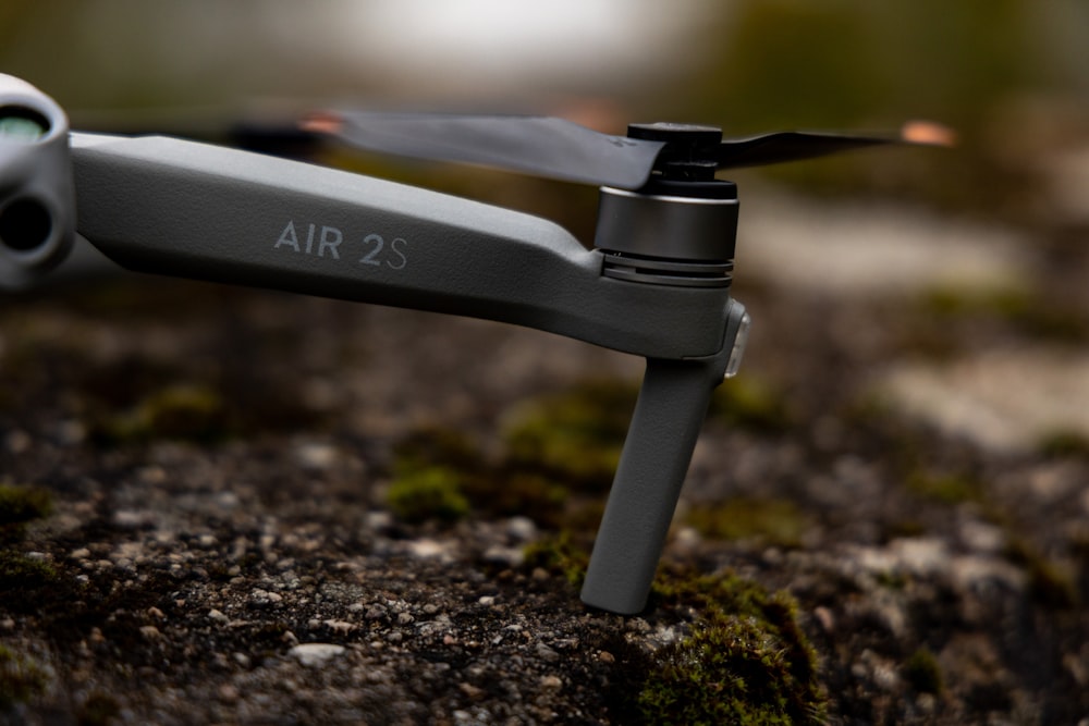 a close up of a remote control flying in the air