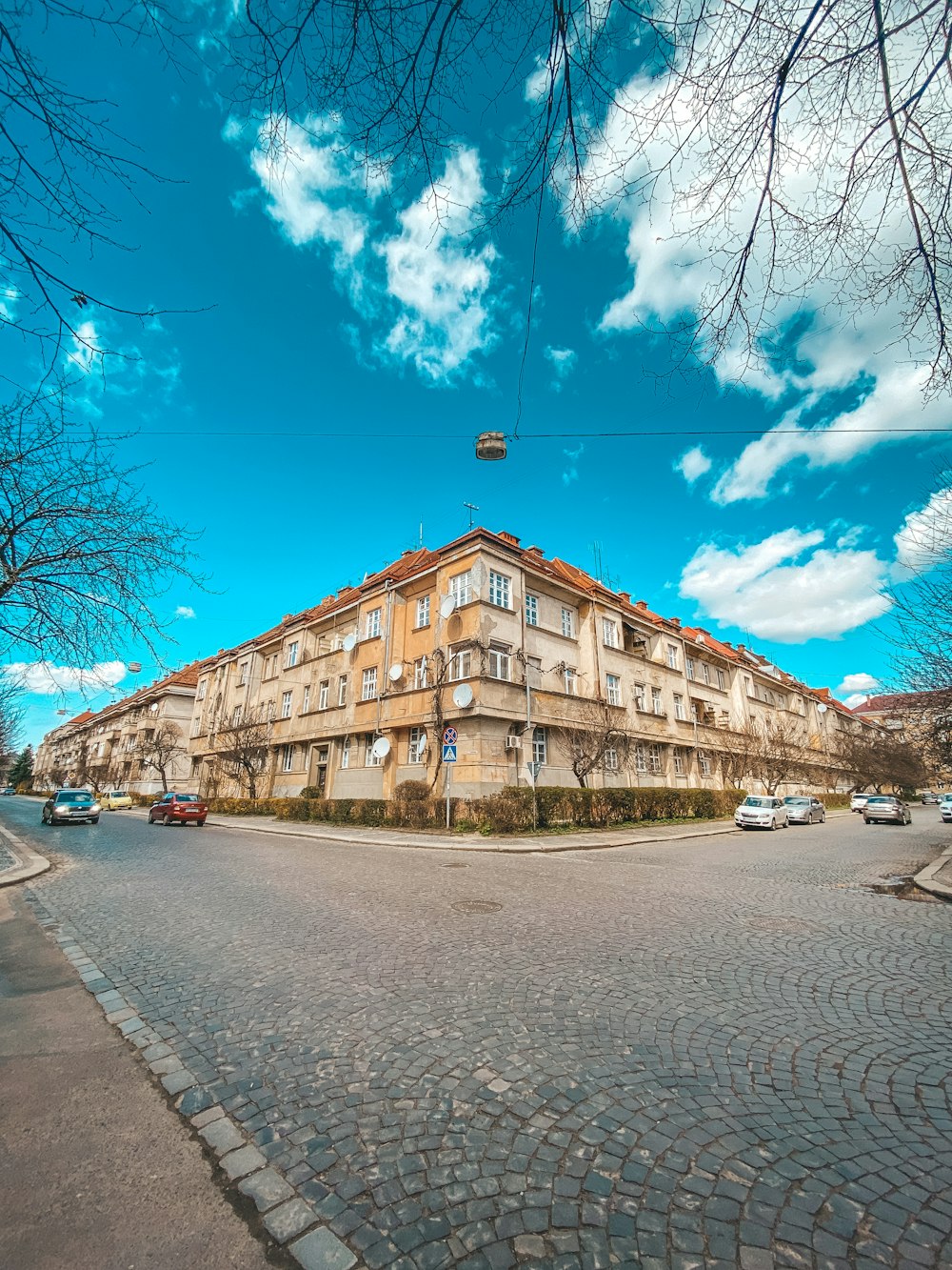 a large building sitting on the side of a road