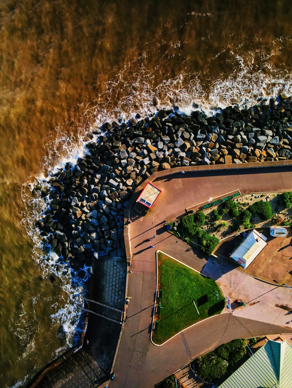 an aerial view of a beach and a body of water