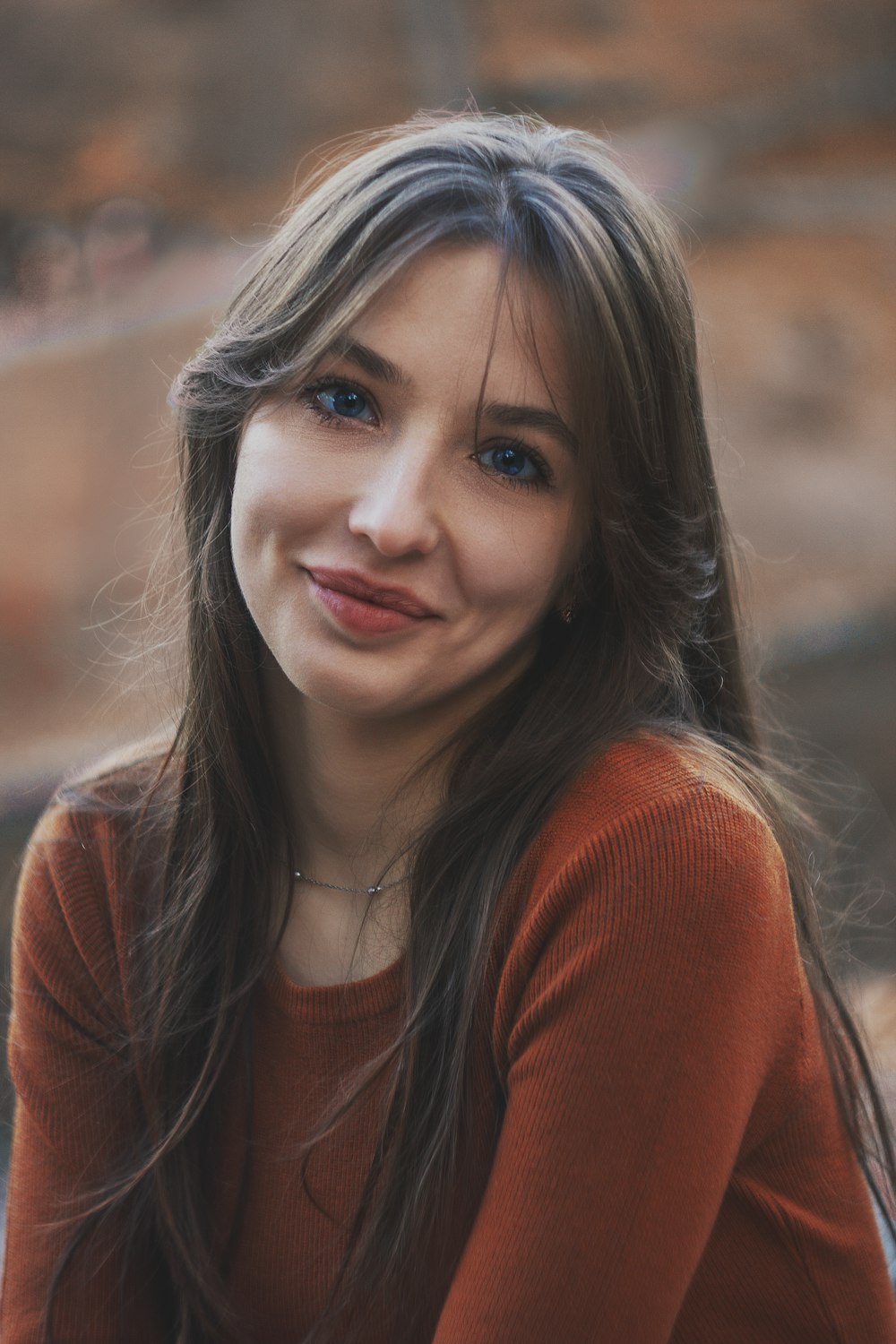 a close up of a person with long hair