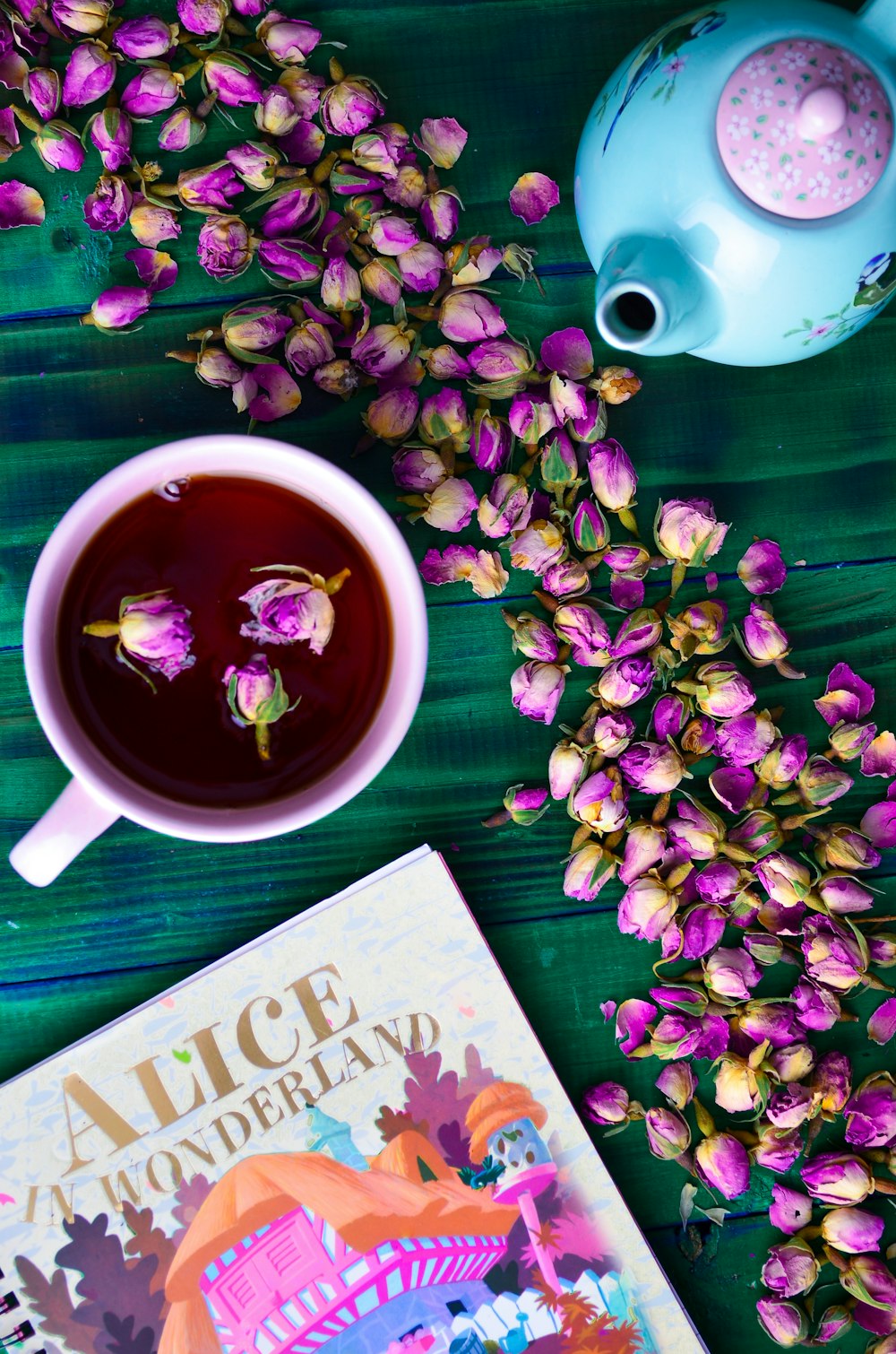 a cup of tea and a book on a table