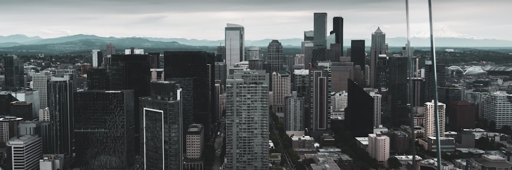 an aerial view of a city with tall buildings