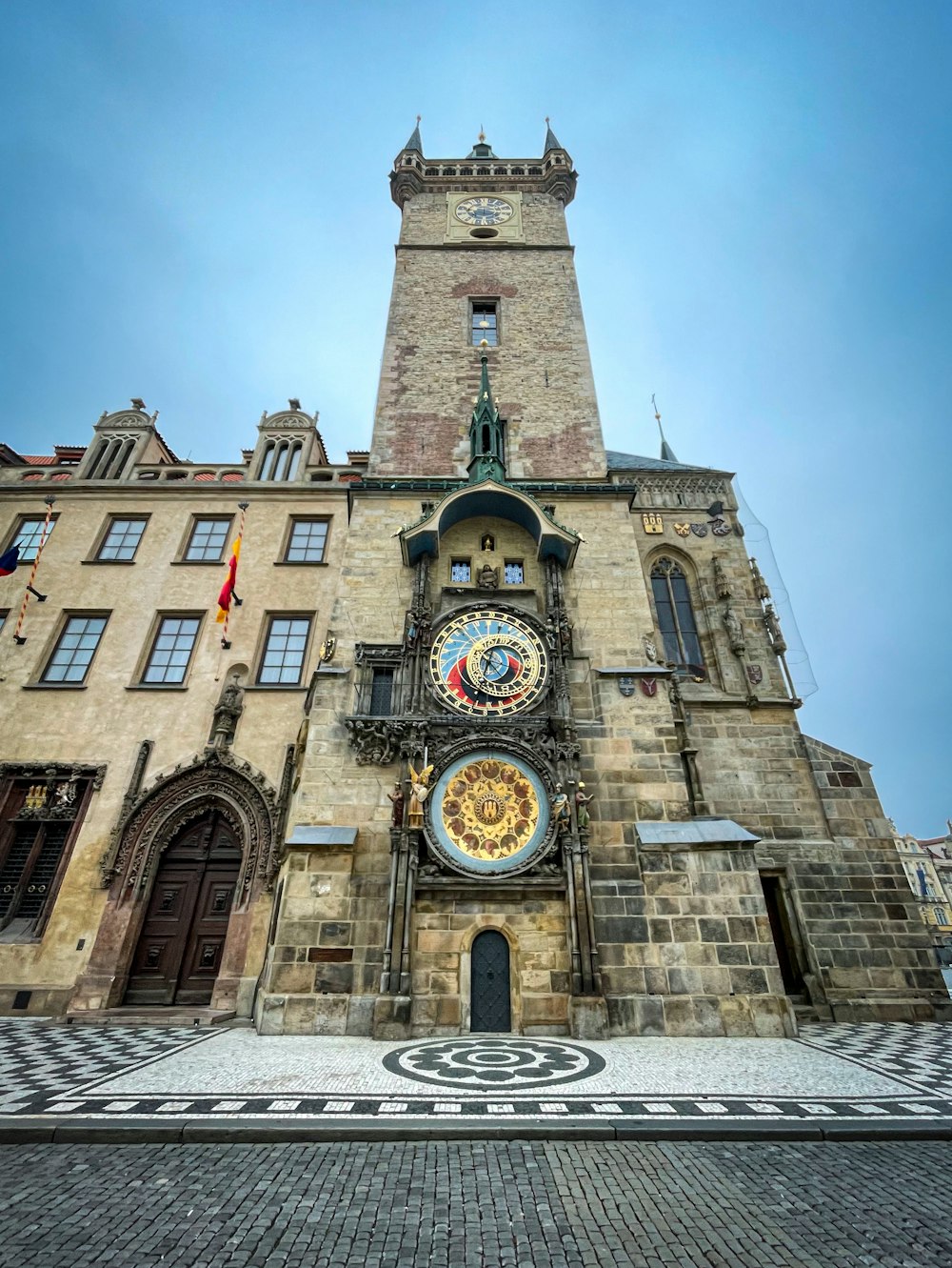 a tall building with a clock on the front of it