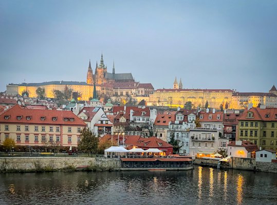 A view of a city from across a river — Prague, Czech Republic