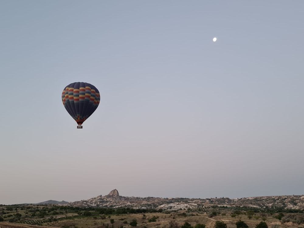 a hot air balloon flying in the sky