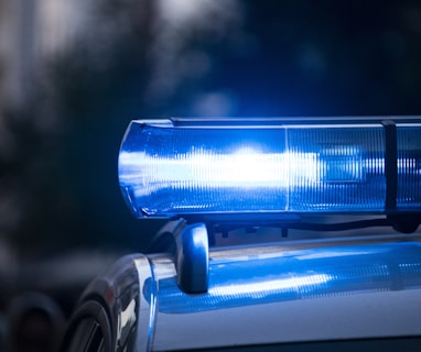 a close up of a police car with its lights on