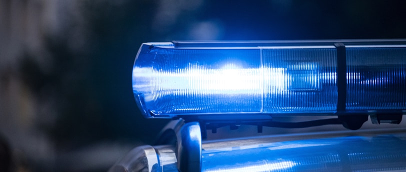 a close up of a police car with its lights on