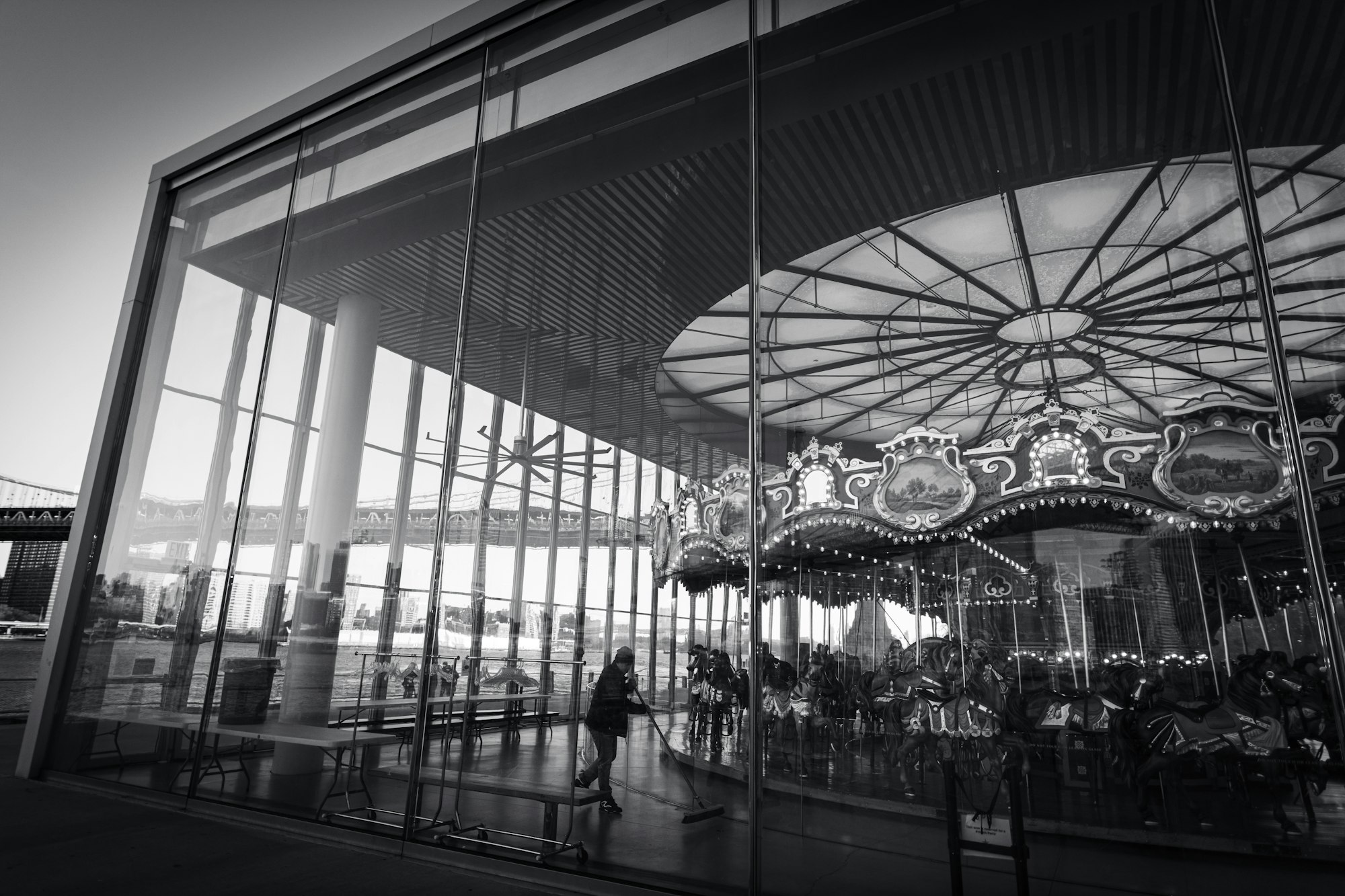 a black and white photo of a merry go round