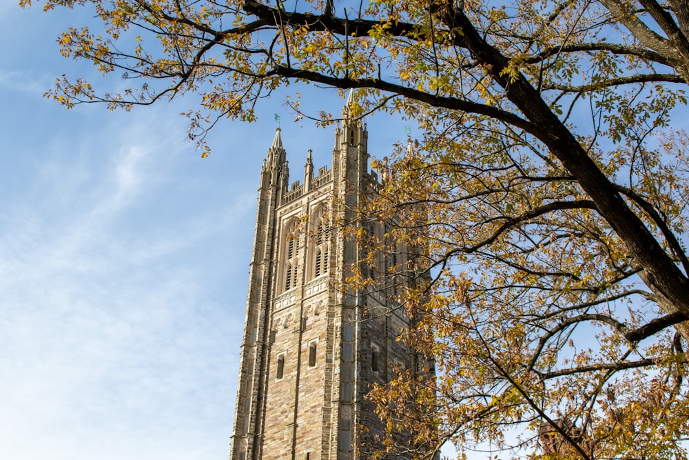 a tall tower with a clock on the top of it