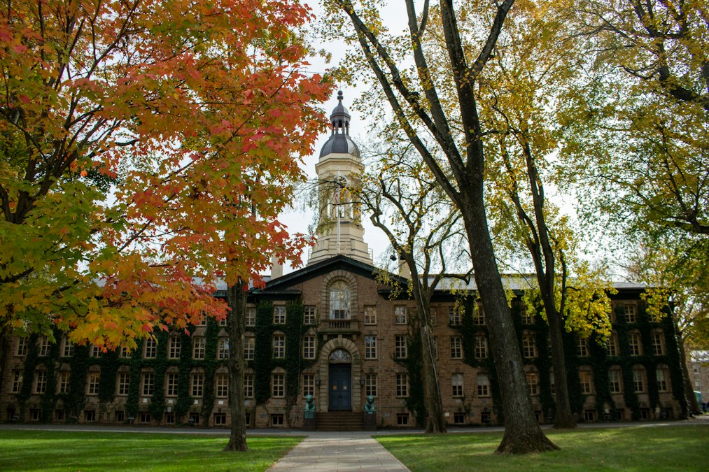 University building with clock tower representing academic prestige and institutional excellence